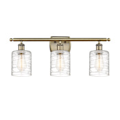 Innovations Lighting Cobbleskill 3 Light 26" Wide Vanity Light Antique Brass / Deco Swirl