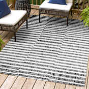 JONATHAN Y Lighting Santa Monica 7-3/4' x 10' Polypropylene Striped, Transitional Indoor / Outdoor Rectangle Area Rug Black / Ivory