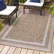 JONATHAN Y Lighting Tuscan Sun 5-1/4' x 7-1/2' Polypropylene Solid Indoor/Outdoor Area Rug Beige / Cream