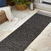 JONATHAN Y Lighting Tuscan Sun 2' x 7-3/4' Border and Solid Indoor/Outdoor Runner Black / Cream