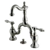 Kingston Brass Tudor 1.2 GPM Bridge, Widespread Bathroom Faucet with Pop-Up Drain Assembly Brushed Nickel