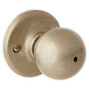 Kwikset Polo Privacy Door Knob Set with Round Rose Antique Brass