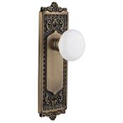 Nostalgic Warehouse White Porcelain Solid Brass Passage Door Knob Set with Egg and Dart Rose and 2-3/8" Backset Antique Brass