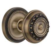 Nostalgic Warehouse Meadows Solid Brass Privacy Door Knob Set with Rope Rose and 2-3/8" Backset Antique Brass