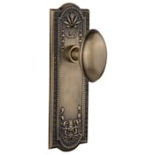 Nostalgic Warehouse Vintage Farmhouse Egg Shaped Homestead Solid Brass Passage Door Knob Set with Meadows Rose and 2-3/8" Backset Antique Brass