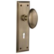 Nostalgic Warehouse Homestead Solid Brass Privacy Door Knob Set with New York Rose, Keyhole and 2-3/8" Backset Antique Brass