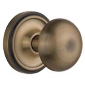 Nostalgic Warehouse New York Solid Brass Privacy Door Knob Set with Classic Rose Plate and 2-3/8" Backset Antique Brass