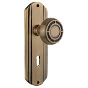 Nostalgic Warehouse Vintage Mission Solid Brass Privacy Door Knob Set with Art Deco Plate, Keyhole and 2-3/8" Backset Antique Brass