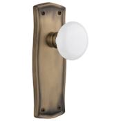 Nostalgic Warehouse White Porcelain Solid Brass Single Dummy Door Knob with Prairie Rose Antique Brass