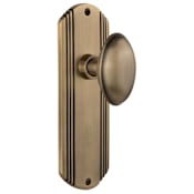 Nostalgic Warehouse Vintage Homestead Solid Brass Oval Passage Door Knob Set with Art Deco Plate and 2-3/4" Backset Antique Brass