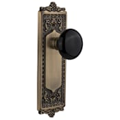 Nostalgic Warehouse Vintage Black Porcelain Passage Door Knob Set with Victorian Brass Egg and Dart Plate and 2-3/4" Backset Antique Brass