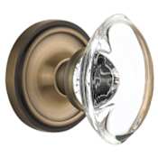 Nostalgic Warehouse Vintage Oval Egg Clear Crystal Privacy Door Knob Set with Solid Brass Classic Rose Plate and 2-3/8" Backset Antique Brass