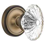 Nostalgic Warehouse Vintage Farmhouse Oval Egg Fluted Flower Crystal Passage Door Knob Set with Solid Brass Classic Rose Plate and 2-3/8" Backset Antique Brass