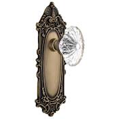 Nostalgic Warehouse Oval Fluted Crystal Solid Brass Privacy Door Knob Set with Victorian Rose and 2-3/8" Backset Antique Brass