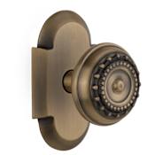 Nostalgic Warehouse Vintage Meadows Solid Brass Privacy Door Knob Set with Cottage Style Plate and 2-3/8" Backset Antique Brass