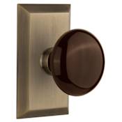 Nostalgic Warehouse Brown Porcelain Solid Brass Dummy Door Knob Set with Studio Rose Antique Brass