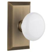 Nostalgic Warehouse White Porcelain Solid Brass Dummy Door Knob Set with Studio Rose Antique Brass