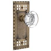 Nostalgic Warehouse Round Clear Crystal Solid Brass Single Dummy Door Knob with Long Craftsman Plate Antique Brass
