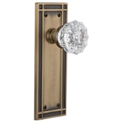 Nostalgic Warehouse Vintage Fluted Crystal Passage Door Knob Set with Solid Brass Mission Style Back Plate and 2-3/8" Backset Antique Brass