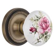 Nostalgic Warehouse Rose Porcelain Solid Brass Privacy Door Knob Set with Rope Rose and 2-3/4" Backset Antique Brass