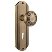 Nostalgic Warehouse Vintage Art Deco Solid Brass Privacy Door Knob Set with Keyhole and 2-3/4" Backset Antique Brass