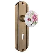 Nostalgic Warehouse Vintage Porcelain Painted Rose Privacy Door Knob Set with Solid Brass Art Deco Plate, Keyhole and 2-3/4" Backset Antique Brass