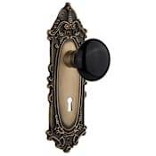 Nostalgic Warehouse Black Porcelain Solid Brass Privacy Door Knob Set with Victorian Rose, Keyhole and 2-3/4" Backset Antique Brass