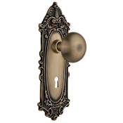 Nostalgic Warehouse New York Solid Brass Privacy Door Knob Set with Victorian Rose, Keyhole and 2-3/4" Backset Antique Brass