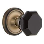 Nostalgic Warehouse Classic Solid Brass Rose Privacy Door Knob Set with Black Waldorf Knob and 2-3/8" Backset Antique Brass