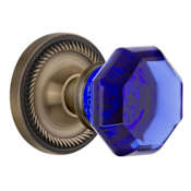 Nostalgic Warehouse Rope Solid Brass Rose Privacy Door Knob Set with Cobalt Waldorf Knob and 2-3/4" Backset Antique Brass