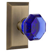 Nostalgic Warehouse Studio Solid Brass Rose Privacy Door Knob Set with Cobalt Waldorf Knob and 2-3/4" Backset Antique Brass