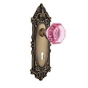 Nostalgic Warehouse Victorian Rose Privacy Door Knob Set with Pink Waldorf Knob and Decorative Skeleton Keyhole for 2-3/8" Backset Antique Brass