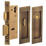 Omnia Keyed Entry Single Cylinder Pocket Door Lock Lacquered Antique Brass