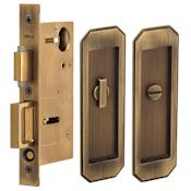 Omnia Traditional Trim Privacy Flush Cup Pocket Door Lock with Turnpiece and Emergency Release Lacquered Antique Brass