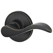 Schlage Seville Right Handed Non-Turning One-Sided Dummy Door Lever with Round Rose from the J-Series Aged Bronze