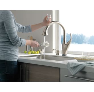 Delta-9192T-SD-DST-Faucet Touch Feature in Use in Brilliance Stainless with Soap Dispenser