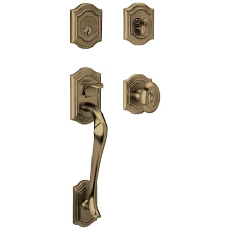 Baldwin Bethpage Sectional Single Cylinder Keyed Entry Handleset with 5077 Interior Knob from the Estate Collection Satin Brass and Black