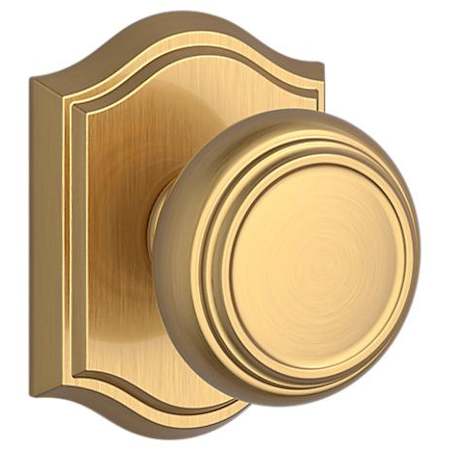 Baldwin Traditional Passage Door Knob with Arch Rose Lifetime Satin Brass