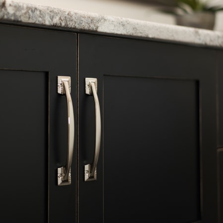 Belwith Keeler-B056554-Pull on Dark Wood Cabinet