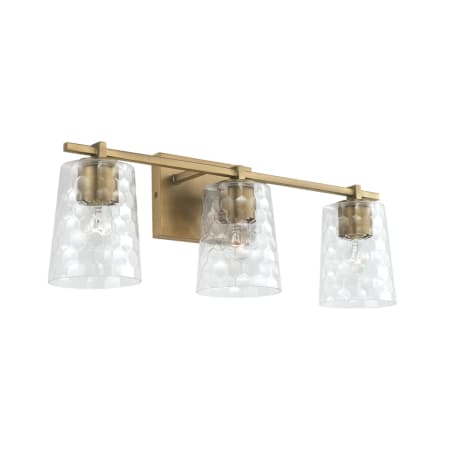Capital Lighting 3 Light 24" Wide Bathroom Vanity Light with Patterned / Etched Glass Shades Aged Brass