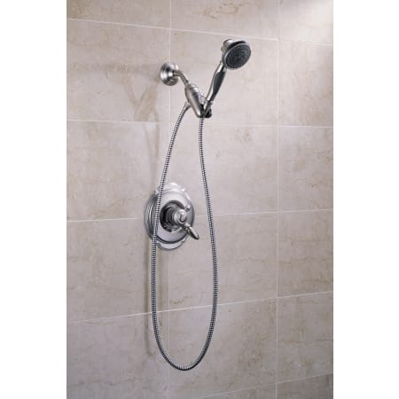 Delta-54613-Installed Handshower and Trim in Brilliance Stainless