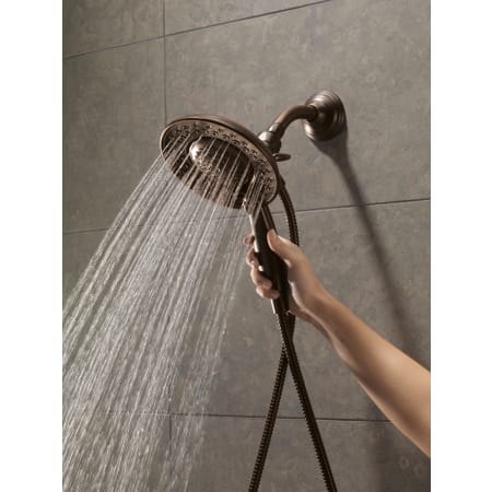 Delta-58045-Running Handshower in Venetian Bronze