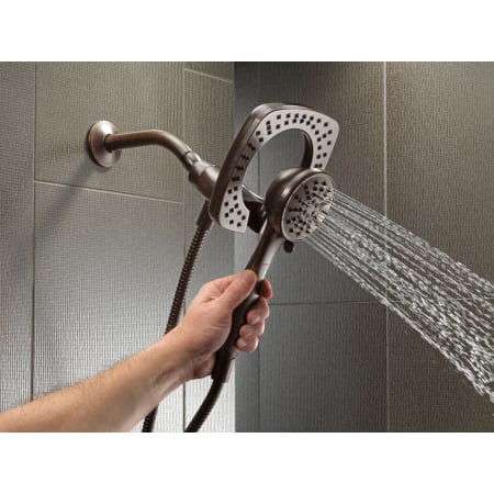 Delta-58064-Running Handshower in Venetian Bronze