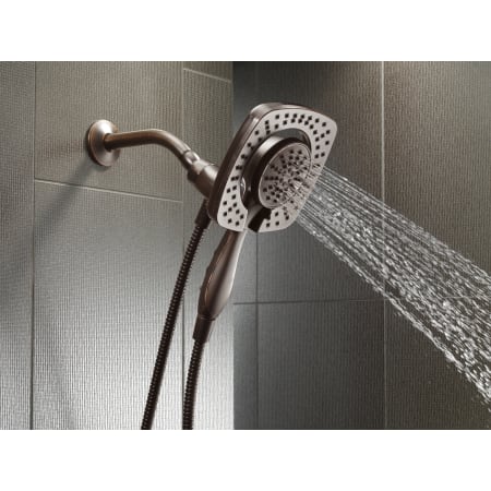 Delta-58064-Running Handshower in Venetian Bronze