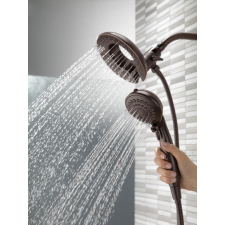 Delta-58469-PK-Running Shower Head and Handshower in Venetian Bronze