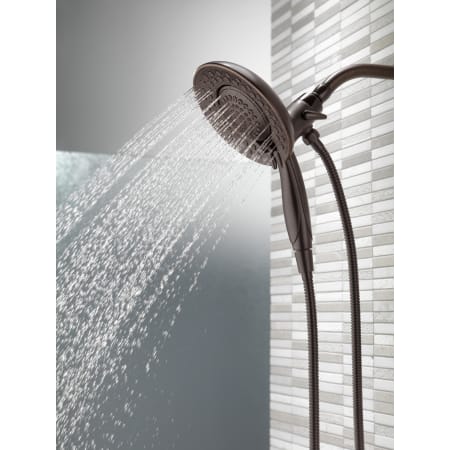 Delta-58469-PK-Running Shower Head and Handshower in Venetian Bronze