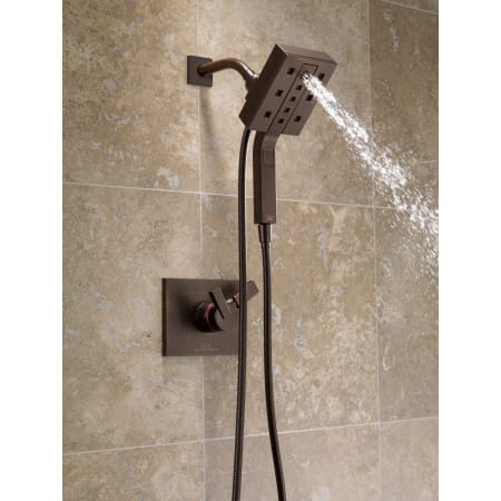 Delta-58470-Running Handshower in Venetian Bronze