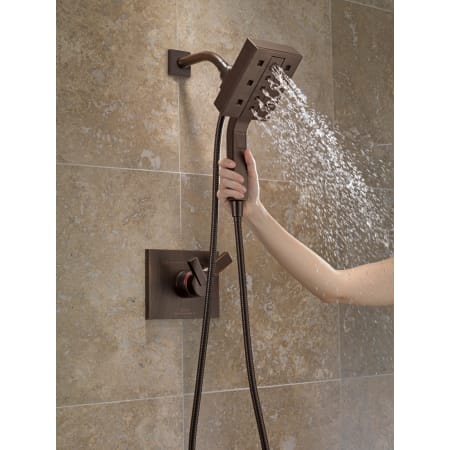 Delta-58470-Running Handshower in Venetian Bronze