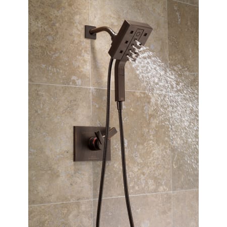 Delta-58470-Running Handshower in Venetian Bronze