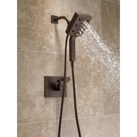 Delta-58470-Running Handshower in Venetian Bronze